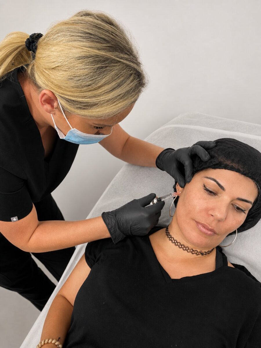Jenny Cader performing a collagen stimulator treatment to restore facial structure and stimulate natural collagen production at her clinic in Hertford.